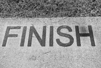 Finish line on pavement black and white